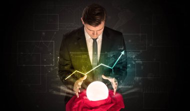 İşadamı borsa sihirli bir top ile geleceği tahmin