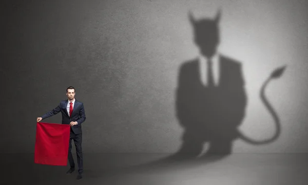 Omul de afaceri cu umbra diavolului și conceptul de toreador — Fotografie, imagine de stoc
