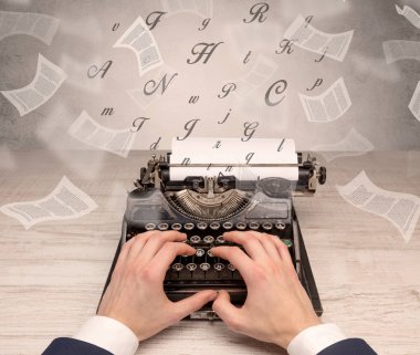 Belge çevresinde uçan ile el typewriting