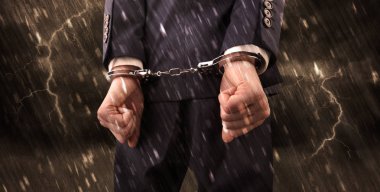 Stormy wallpaper with close handcuffed man clipart