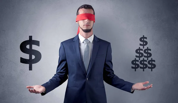 Man with ribbon on his eye holding dollar signs — Stock Photo, Image