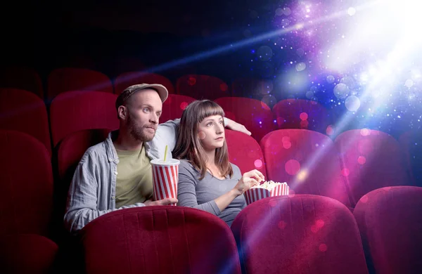 Romantic couple sitting at spectacle — Stock Photo, Image