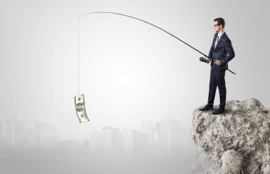 İşadamı Balık tutma Doları bir rock