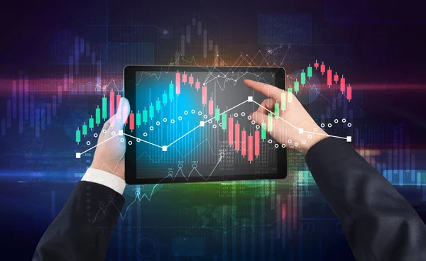 Hand holding tablet with global reports and stock market change concept — Stock Photo, Image