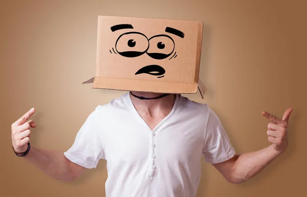 Man with cardboard head — Stock Photo, Image