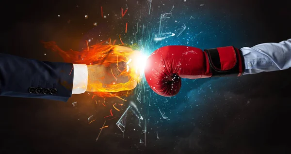 Fighting hands breaking glass with fire and water — Stock Photo, Image