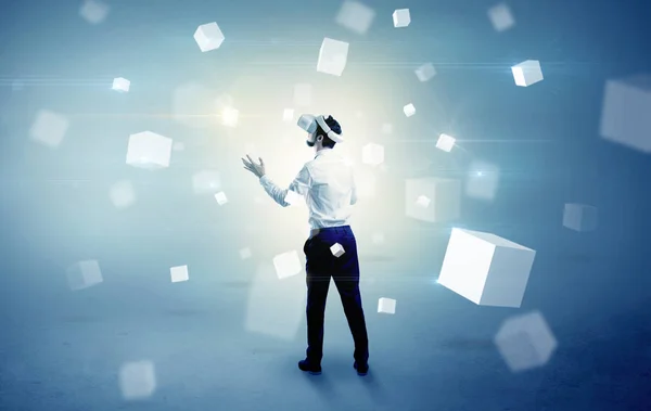 Businessman with vr goggle and falling cubes — Stock Photo, Image