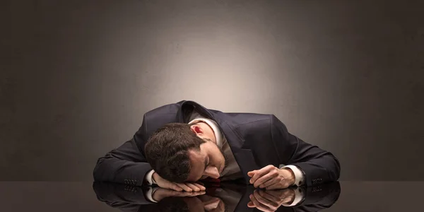 Businessman fell asleep at his workplace