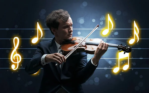 Young fiddler with music sheet — Stock Photo, Image