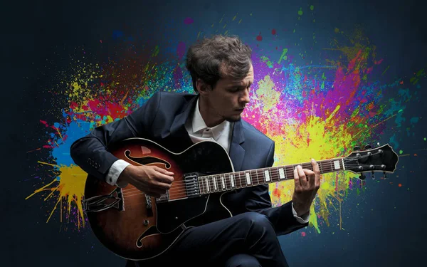 Composer with splotch and his guitar — Stock Photo, Image