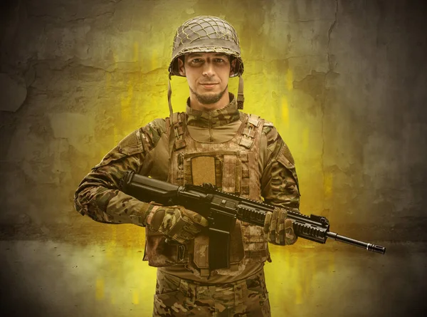 Ruined wallpaper with hazard soldier — Stock Photo, Image