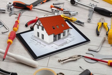 Tablet ve araçları 3d ev planı kavramı ile