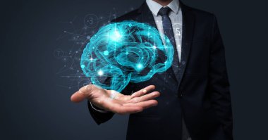 İnsan beyni elinde tutan adam