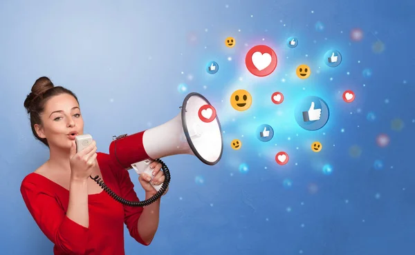 Person speaking in loudspeaker with social media concept — Stock Photo, Image