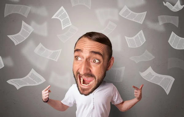 Big head on small body with flying documents — Stock Photo, Image