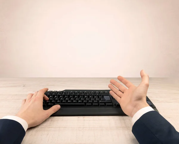 Elegant businessman hand typing on light background — Stock Photo, Image