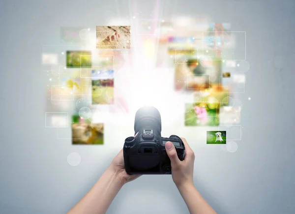 Hand vangt gebeurtenissen in het leven met digitale camera — Stockfoto