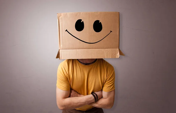 Man with cardboard head — Stock Photo, Image