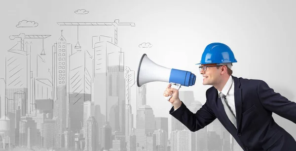 Architect standing and yelling to a big city panorama — Stock Photo, Image