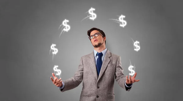 Person juggle with dollar symbol — Stock Photo, Image