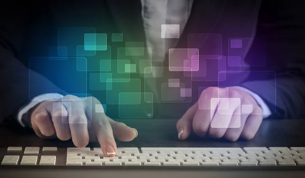 Woman typing on keyboard with colorful concept — Stock Photo, Image