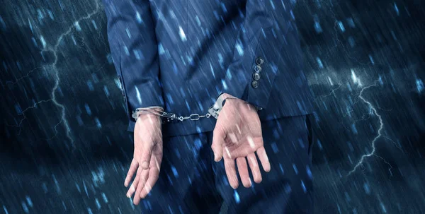 Stormy wallpaper with close handcuffed man — Stock Photo, Image