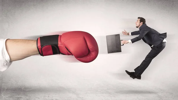 Empresário é demitido por uma enorme mão de boxe — Fotografia de Stock