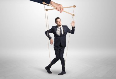 Büyük bir el tarafından Kurşunlu kukla işadamı