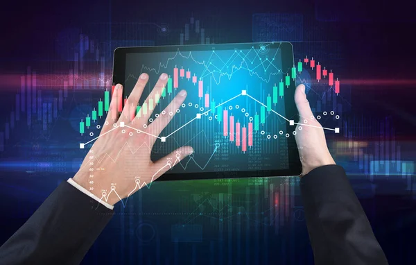 Hand holding tablet with global reports and stock market change concept — Stock Photo, Image
