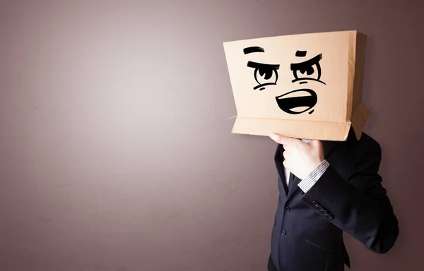 Man with cardboard head — Stock Photo, Image