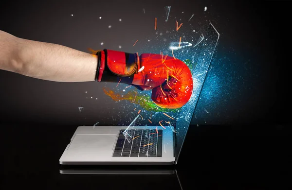 Firing hand breaking laptop screen glass — Stock Photo, Image