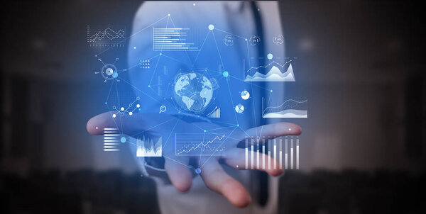 Hand holding charts in his hand