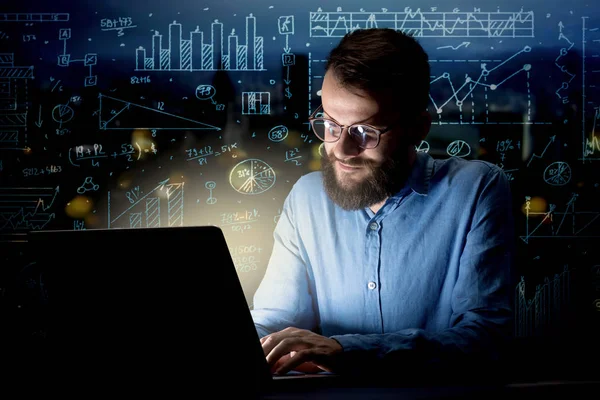 Businessman in the office at night — Stock Photo, Image