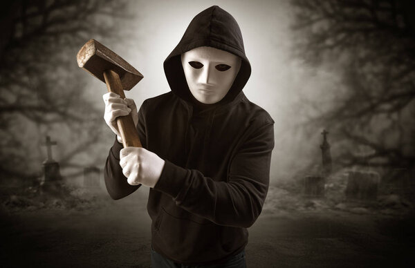 Aggressive hunter in abandoned graveyard concept