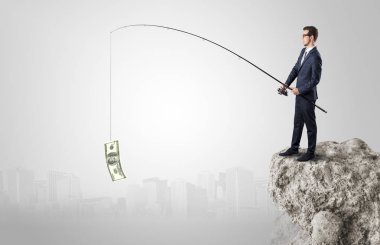 İşadamı Balık tutma Doları bir rock