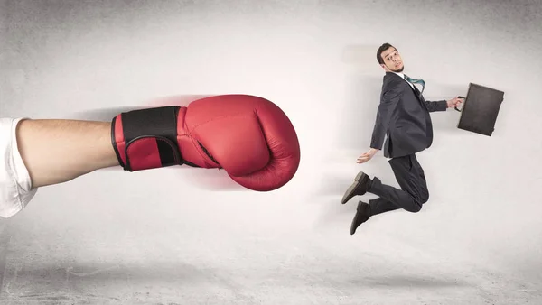 Empresário é demitido por uma enorme mão de boxe — Fotografia de Stock