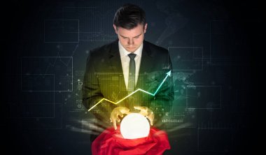 İşadamı borsa sihirli bir top ile geleceği tahmin