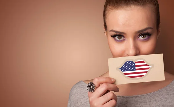 Person holding USA flag card