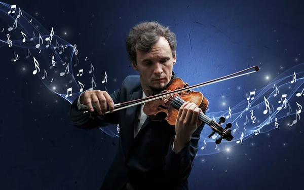 Lonely composer playing on violin — Stock Photo, Image