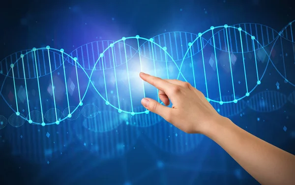 Hand touching DNA molecule — Stock Photo, Image