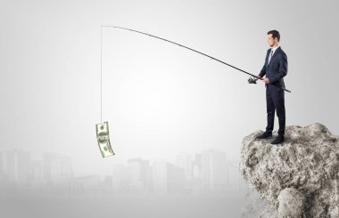 İşadamı Balık tutma Doları bir rock
