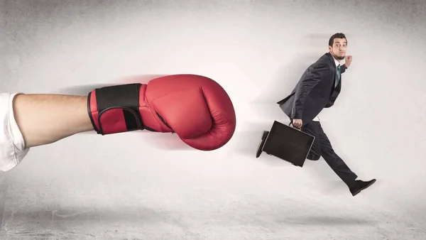 Empresário é demitido por uma enorme mão de boxe — Fotografia de Stock