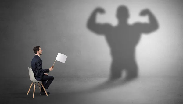 Businessman staying and offering stuffs to a shadow man — Stock Photo, Image