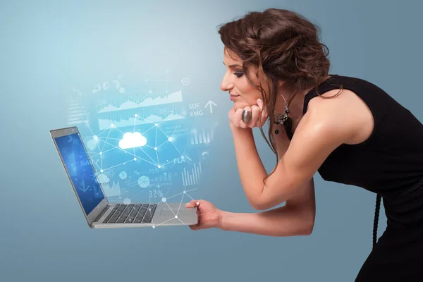 Woman holding laptop with cloud based system concept — Stock Photo, Image