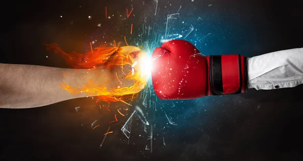 Fighting hands breaking glass with fire and water — Stock Photo, Image