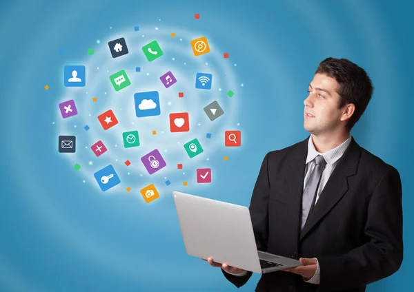 Person presenting new application icons and symbols — Stock Photo, Image