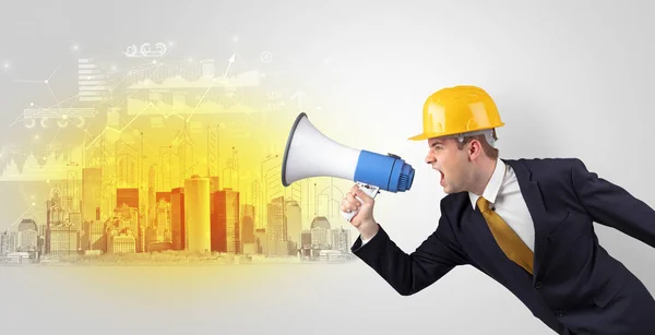 Architect standing and yelling to a big city panorama — Stock Photo, Image