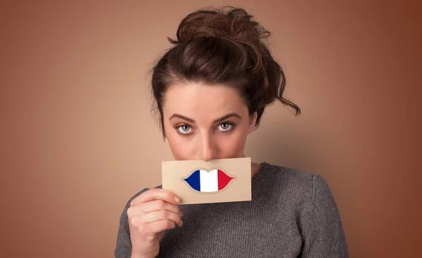 Person holding French flag card — Stock Photo, Image