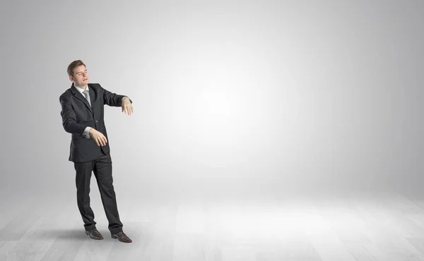 Zombi businessman walking in a copy space — Stock Photo, Image