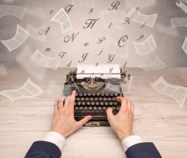 Belge çevresinde uçan ile el typewriting